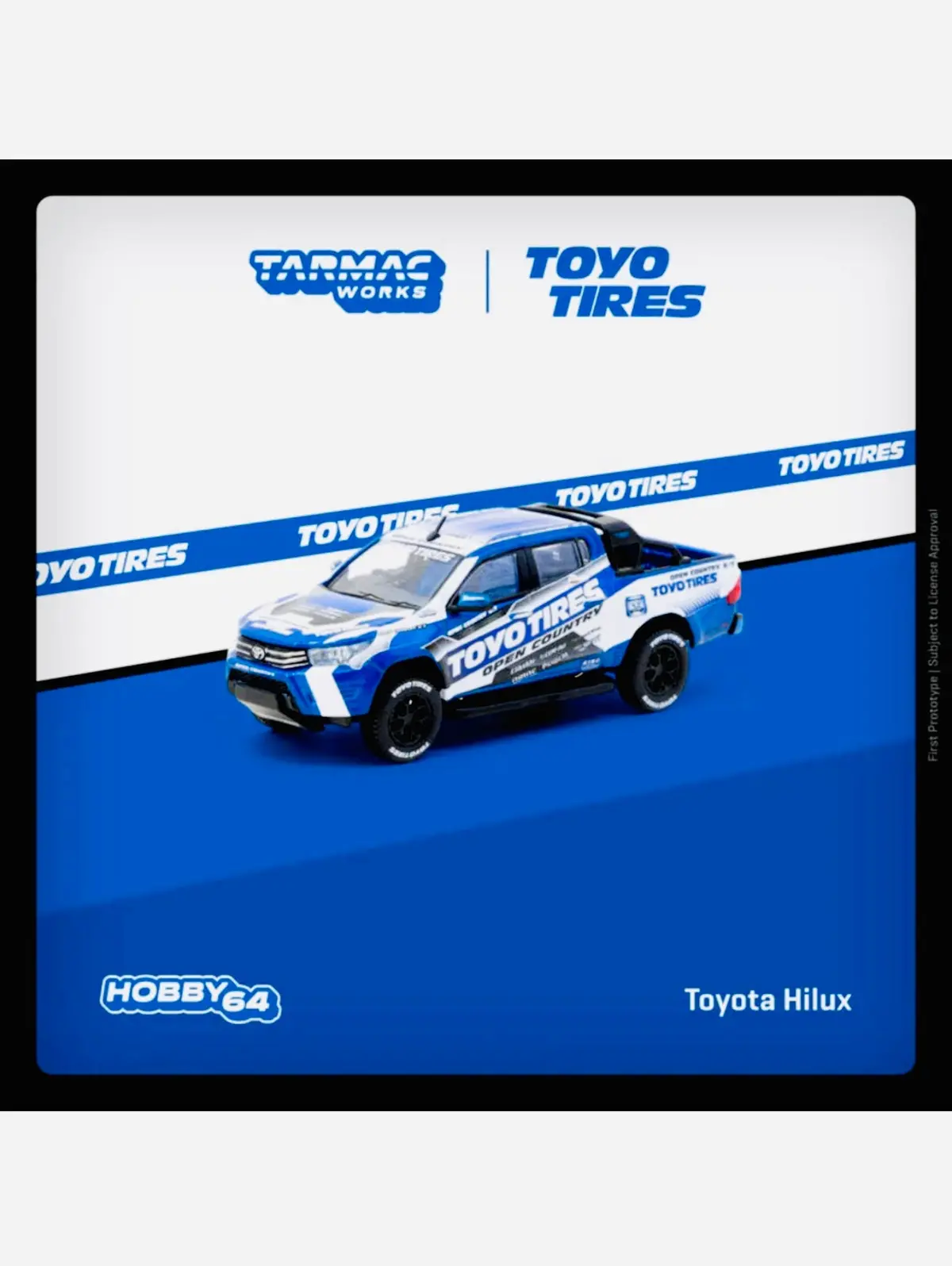 Tarmac Works Factory Sealed Hobby 64 Toyota Hilux Toyo Tires Blue W/ Graphics 1